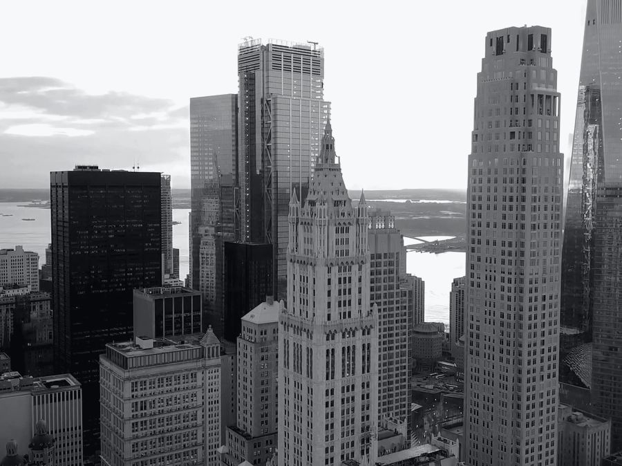 Towers in Lower Manhattan, the harbor beyond.