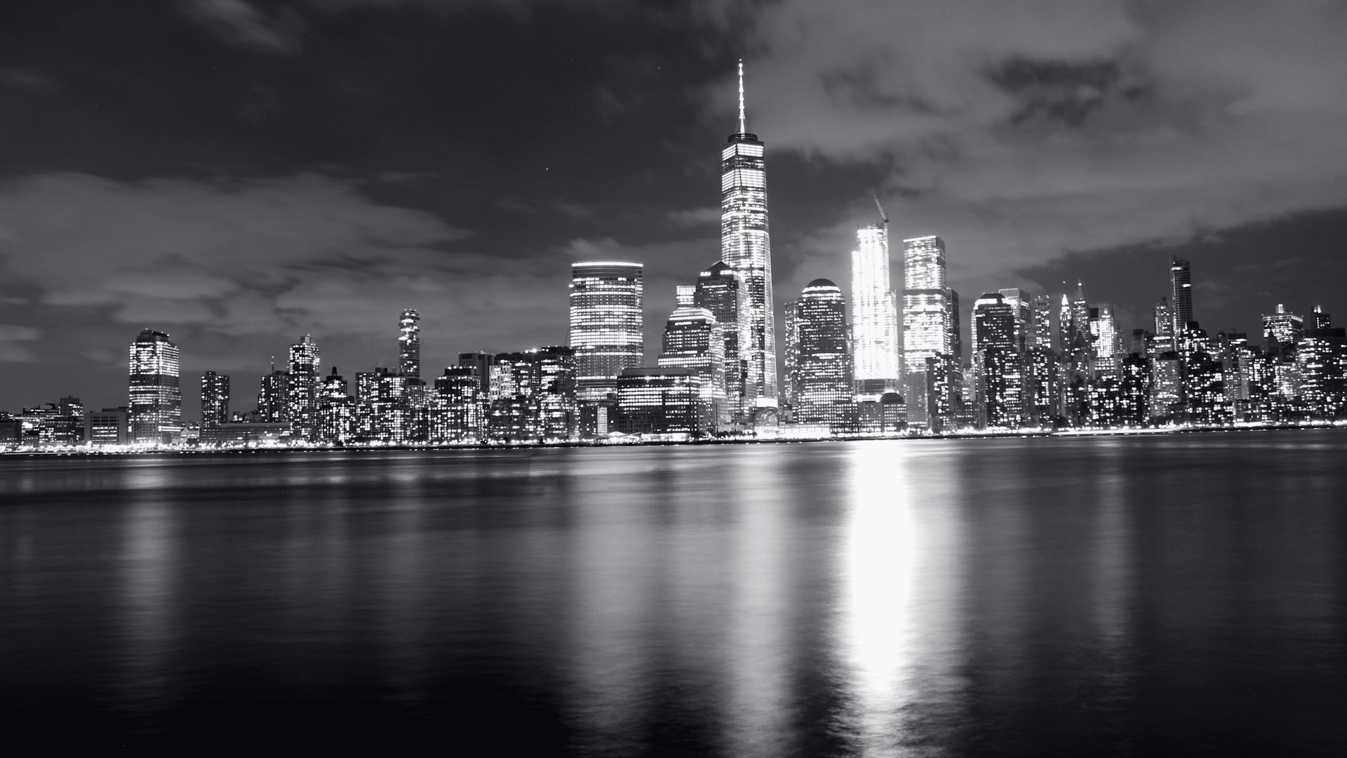 Lower Manhattan at night, seen across the Hudson from Jersey City.