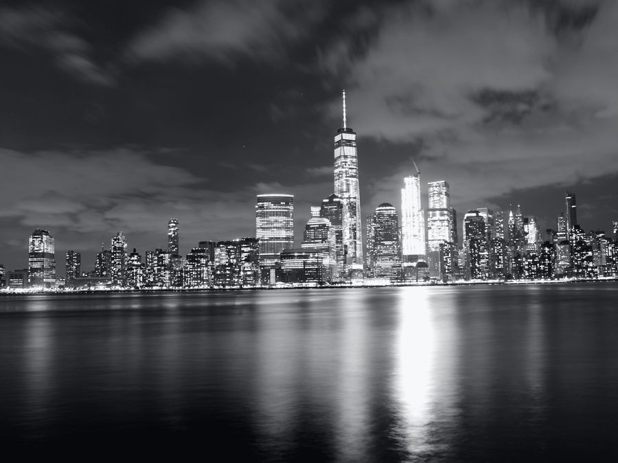 Lower Manhattan at night, seen across the Hudson from Jersey City.